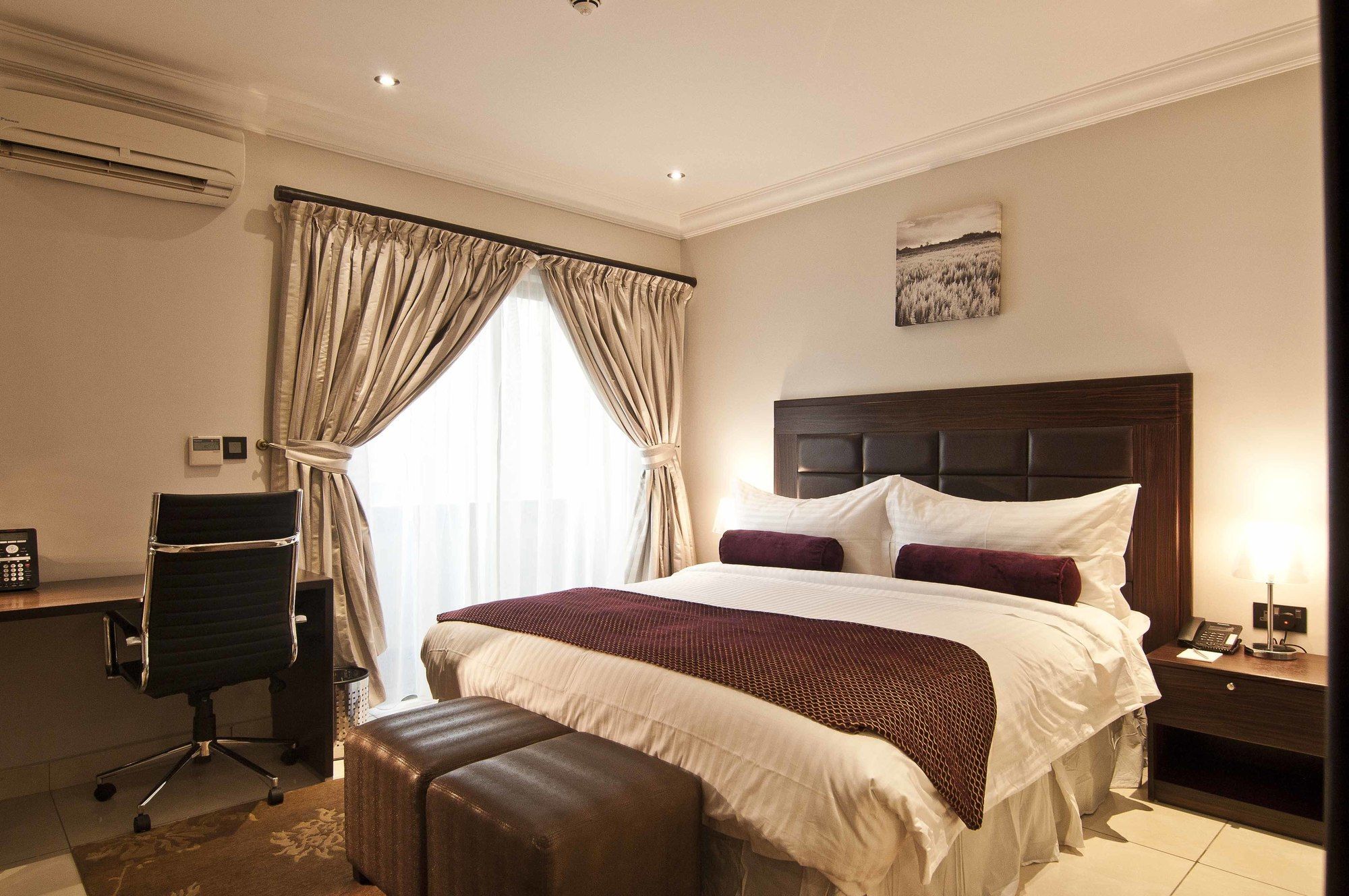 L'Eola Suites Абуджа Экстерьер фото
